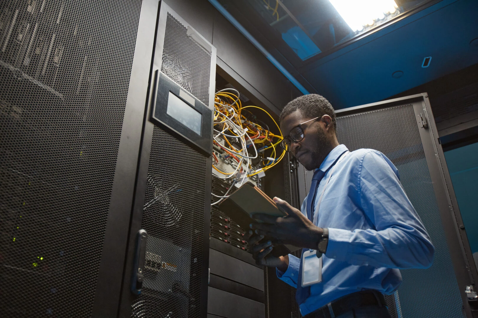 African American Network Engineer in Server Room